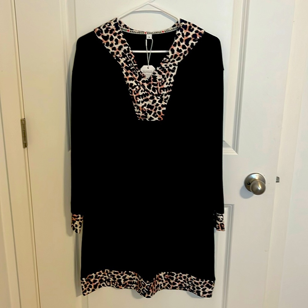 Brand new black dress with leopard trim.